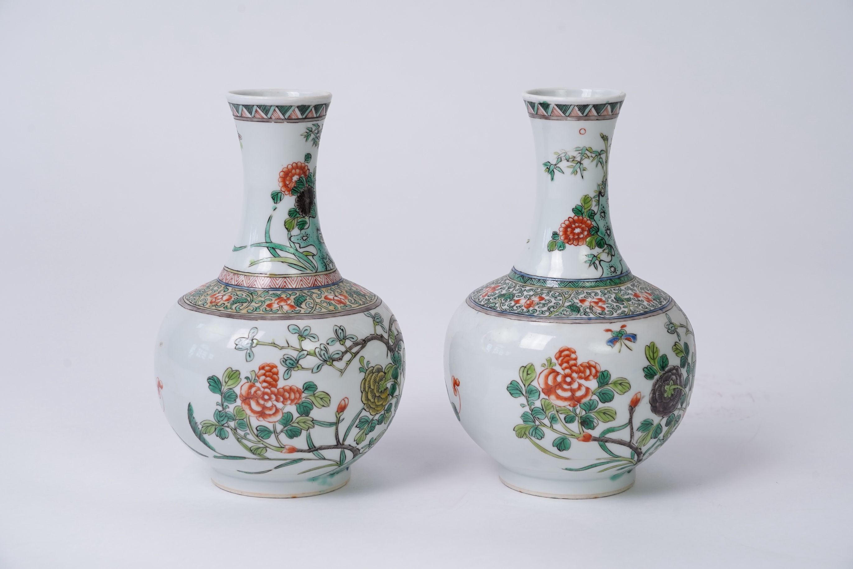 A pair of Chinese famille verte bottle vases, early 20th century
